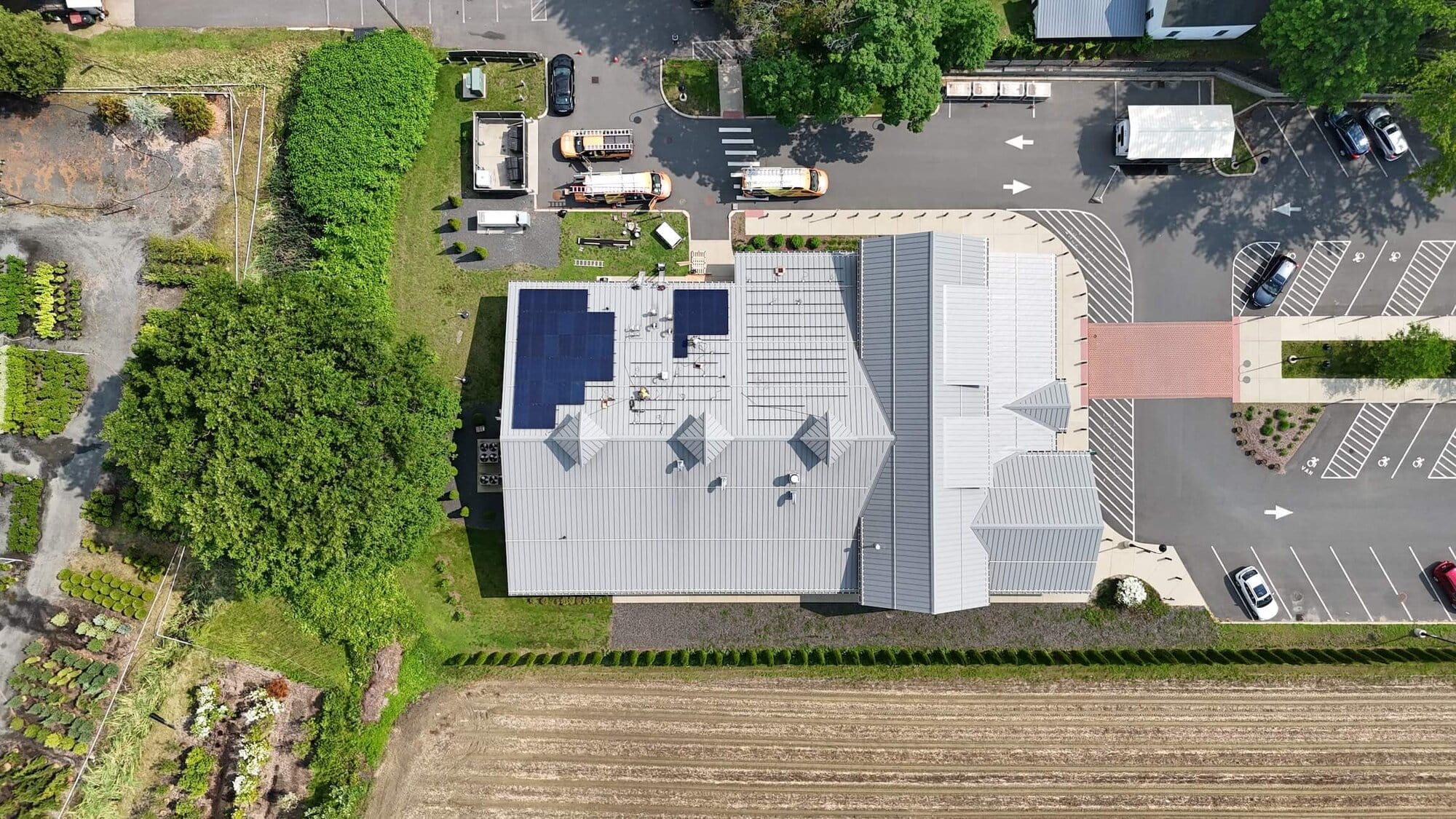 Solar panels installed on the roof of a commercial building for sustainable energy.