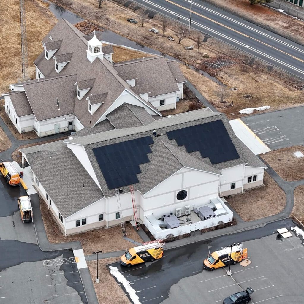 Solar panel installation on commercial building for renewable energy solutions.