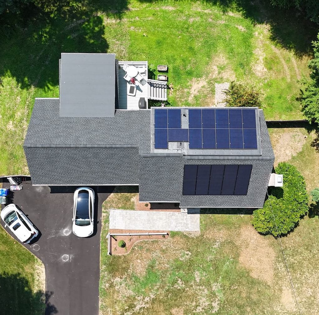 Solar panels on residential roof for clean energy and cost savings.