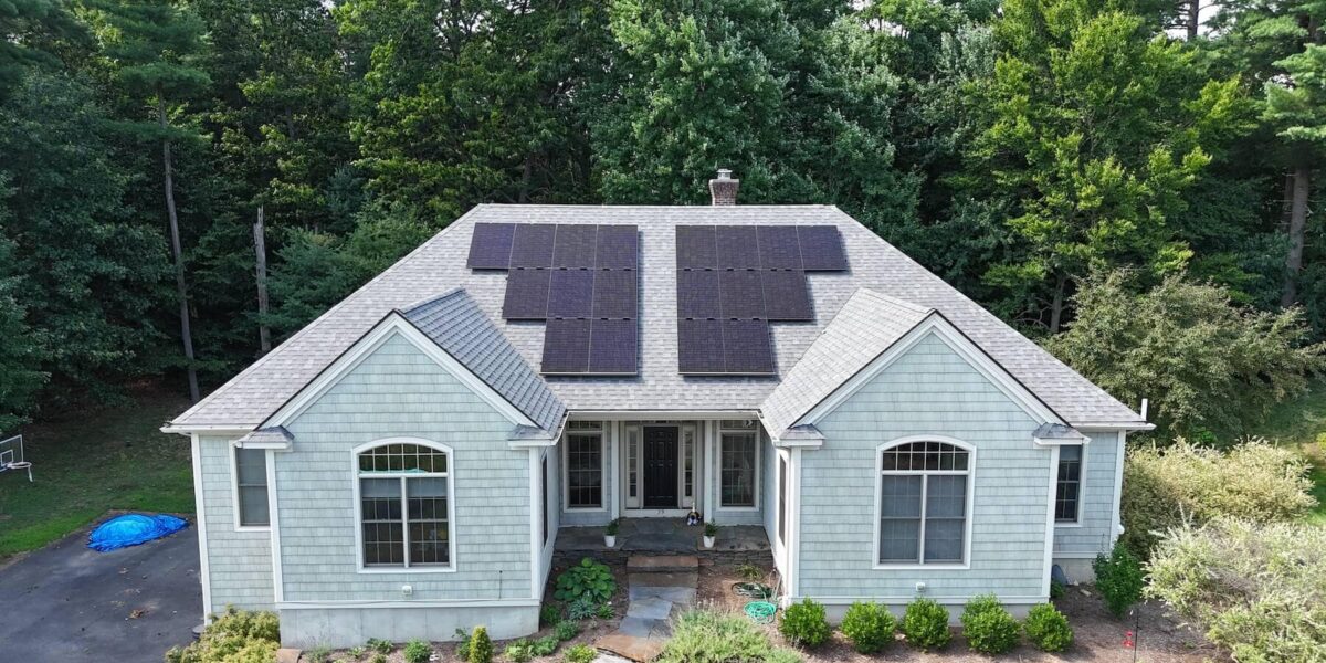 Solar panel installation on residential roof for clean energy efficiency.