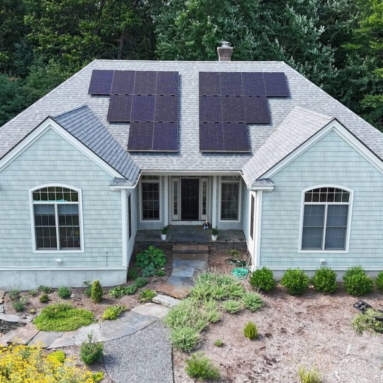 Solar power installation on a modern home roof, promoting renewable energy solutions.